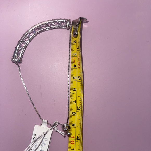 NWT🆕 Cate d’Argent 925 Sterling Silver Floating
CZ Channel Adjustable Bracelet - Picture 11 of 11